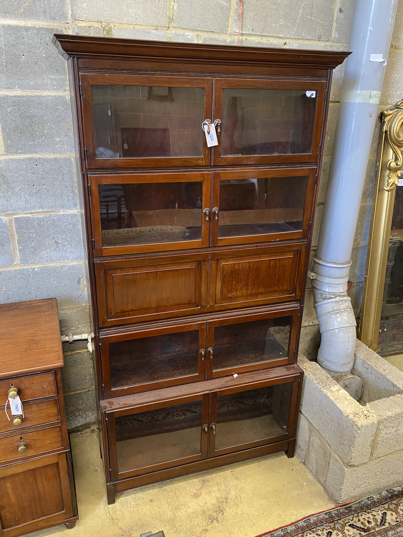 A Globe Wernicke style mahogany five section graduated bookcase, length 98cm, depth 25cm, height 178cm